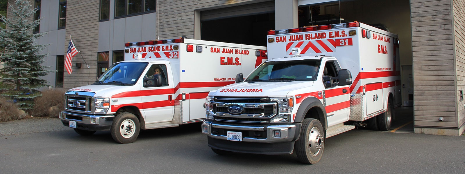 San Juan EMS Ambulances Leaving Garage