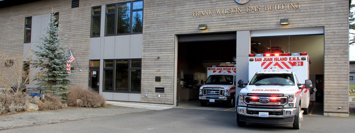 San Juan EMS Ambulances Leaving Garage